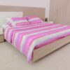 Juego de cama tela blanca y degrade fucsia